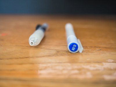 transparent pens on wooden surface thumbnail