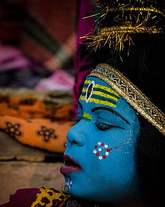 person with face paint thumbnail