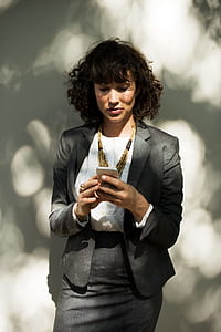 woman holding smartphone thumbnail