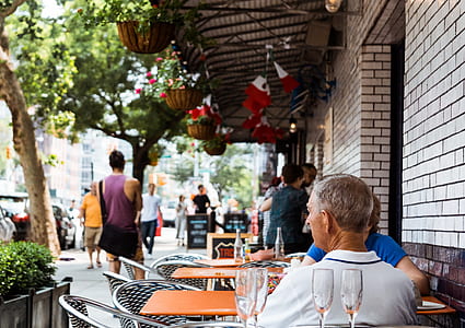 two men sitting beside table thumbnail