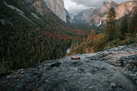 photography of mountain and trees thumbnail