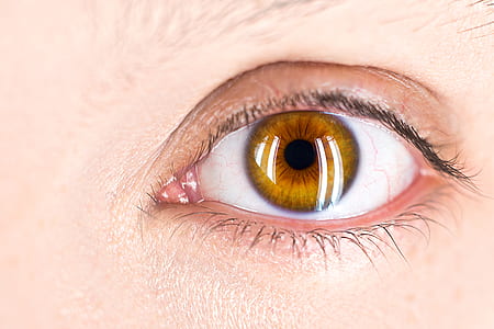 person showing left eye thumbnail
