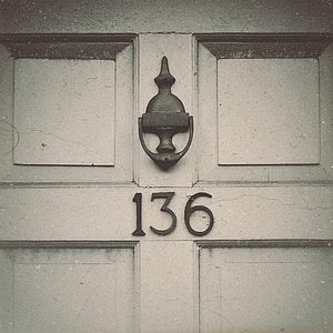 grey steel door knocker above 136 door number thumbnail