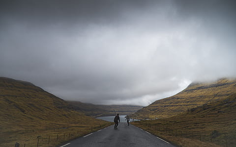 two person skating on asphalt road thumbnail