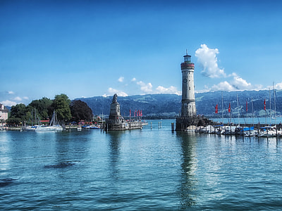 Lighthouse under blue sky thumbnail