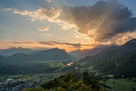 aerial photography of houses and mountains at golden hour thumbnail
