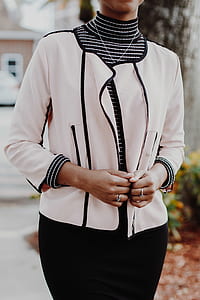 person wearing white zip-up blazer thumbnail
