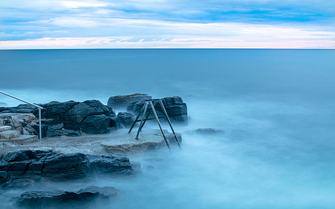 stones near water with fog thumbnail