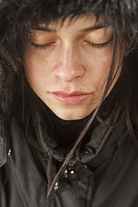 man wearing black parka thumbnail