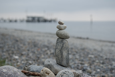 selective-focus photography of cairn stones thumbnail