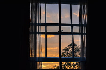 closed windowpane during golden hour thumbnail