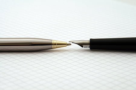 grey ballpoint pen and black fountain pen thumbnail