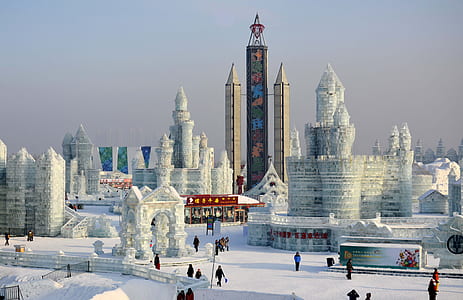 landscape photography of cityscape covered by snow thumbnail