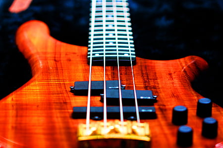 black and red electric bass guitar thumbnail