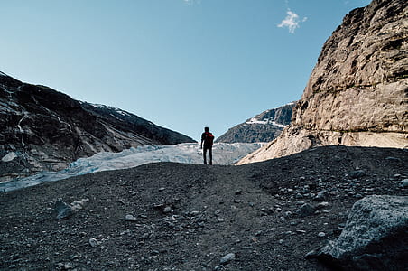man surrounded by mountain thumbnail