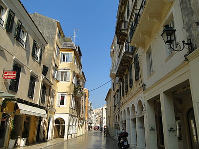 concrete street between two buildings thumbnail
