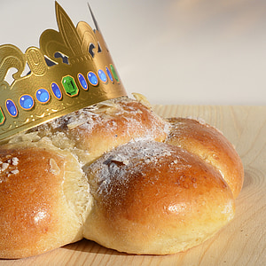 baked bread with crown on board thumbnail