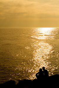 silhouette photography of man and woman thumbnail