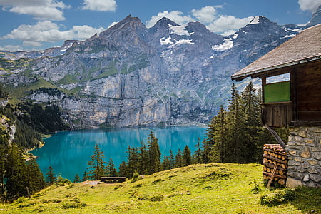 landscape photography of mountain and lake thumbnail