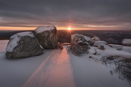 photo of rock filled with snow thumbnail
