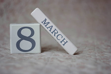 march and 8 printed cubes on pink surface thumbnail
