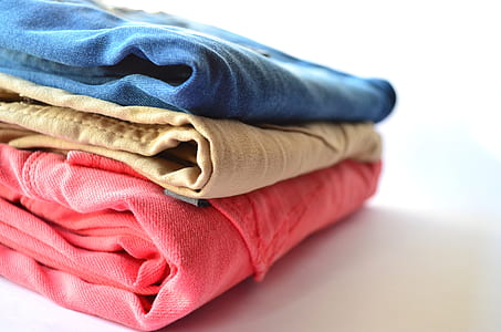 three red, brown, and blue denim bottomes thumbnail