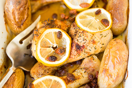 cooked meat with sliced lemon thumbnail