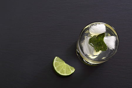 lime beside drinking glass thumbnail