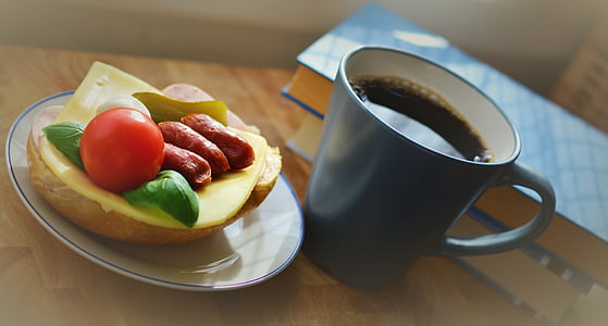 sliced of fruit on plate near black mug thumbnail