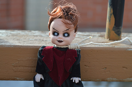 female doll with rope on neck thumbnail