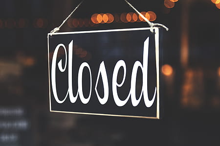 selective focus photo of closed door sign thumbnail