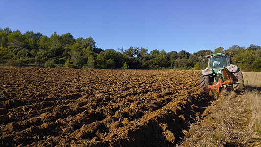green tractor on farm thumbnail