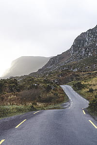 landscape photo of road between mountain thumbnail