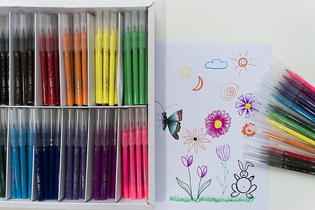 marker set beside printer paper thumbnail