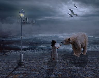 girl holding bear near ocean thumbnail