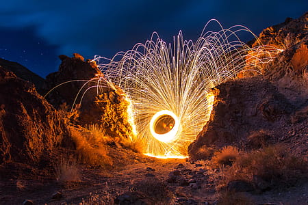 spiral firework in mountains thumbnail