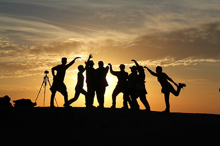 silhouette photo of group of people thumbnail
