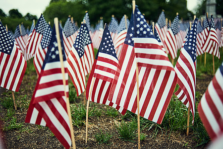 USA flag lot during daytime thumbnail