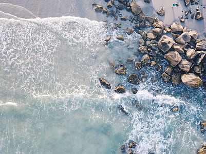 gray stone on seashore thumbnail