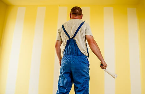 man in blue dungaree pants thumbnail