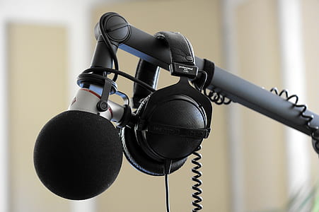 black headphoens on studio microphone thumbnail