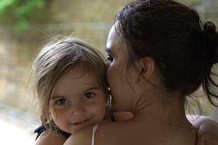 woman and baby standing during daytime thumbnail