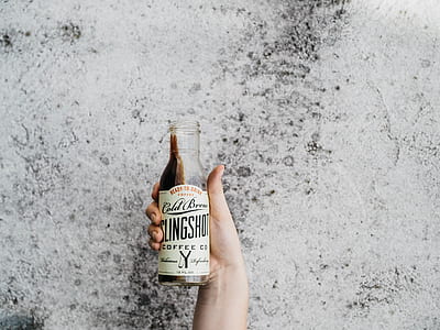 person holding Cold Beer glass bottle thumbnail