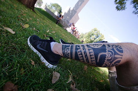 person laying on green lawn grass thumbnail