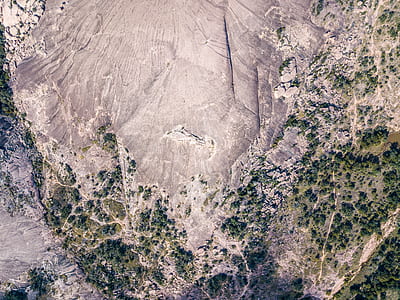 bird's-eye view photo of trees and land during daytime thumbnail