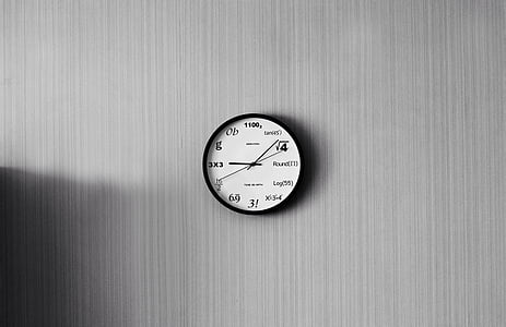 white analog wall clock at 9:08 thumbnail