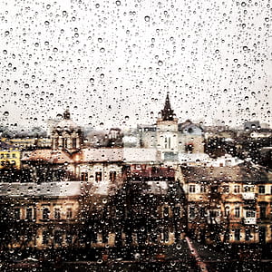 selective focused photo of a window with water drops thumbnail