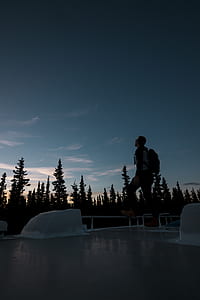 man standing near forest thumbnail