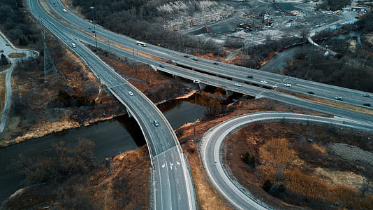 aerial photography of vehicle on roads thumbnail