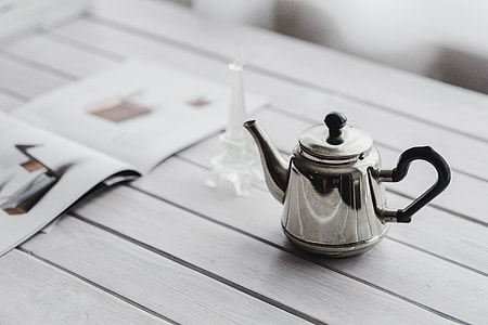 Coffee on a table with other items thumbnail